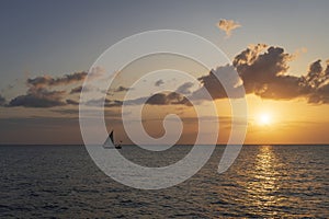 Silhouette of boat at sunset