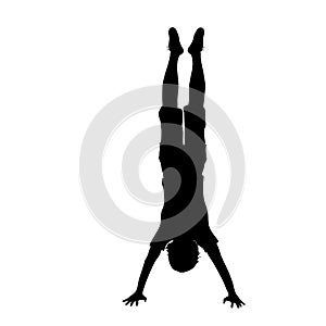 Silhouette boy pose Handstand sport photo