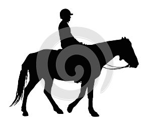 Silhouette of Boy with Protective Helmet Riding Horse
