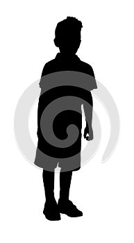 Silhouette of a boy stands