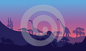 Silhouette of Brachiosaurus and Ankylosaurus