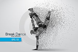 Silhouette of a break dancer from particles.