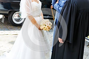 Silhouette of bride, protestant pastor and groom