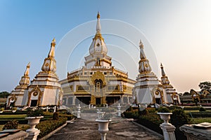 Silhouette of The Buddha Statue in Phra Maha Chedi Chai Mongkol Temple in Roi Et Thailand