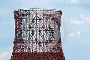 Silhouette of building power plant cooling tower against blue sk