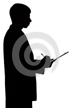Silhouette of a business man signing a document