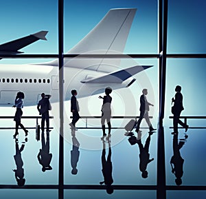 Silhouette of Business People with Airplane Concepts