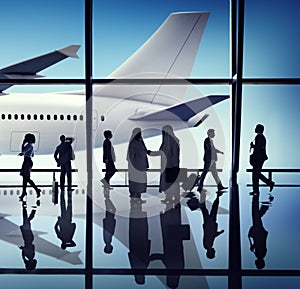 Silhouette of Business People with Airplane Concepts