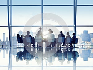 Silhouette of Business Person in a Board Room