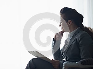 Silhouette of business woman with tablet pc