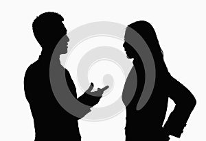Silhouette of businessman and businesswoman talking.
