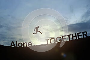 Silhouette of businessman glowing jump alone to together. success concept