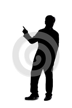 Silhouette of Businessman Pointing at Something