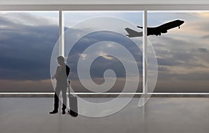 Silhouette of Businessman Traveling at an Airport