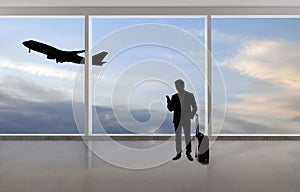 Silhouette of Businessman Traveling at an Airport