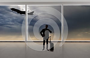 Silhouette of Businessman Traveling at an Airport