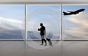 Silhouette of Businessman Traveling at an Airport