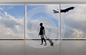 Silhouette of Businessman Traveling at an Airport