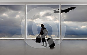 Silhouette of Businessman Traveling at an Airport