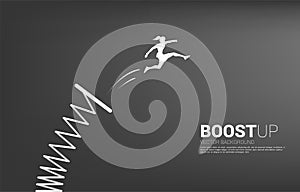 Silhouette of businesswoman jump higher with springboard.