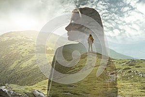 Silhouette of businesswoman with landscapes on background, double exposure.