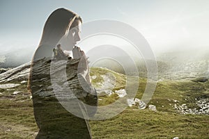 Silhouette of businesswoman with landscapes on background, double exposure.