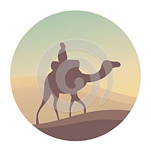 Silhouette of a camel and a bedouin in a hot desert