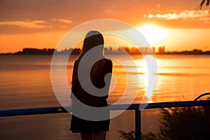 Silhouette of carefree woman in sunset on beach. vacation vitality healthy concept