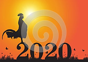 Silhouette of chicken crowing on number 2020 on bright sunrise background, new year celebration concept