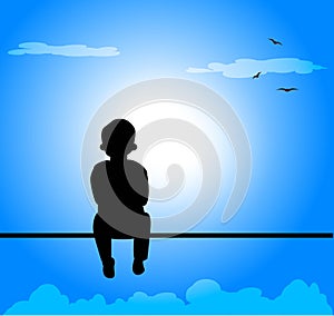 Silhouette of child against blue skies