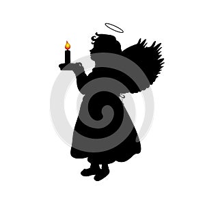 Silhouette christmas angel girl with candle