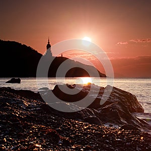 Silhouette of church at sunrise in Crimea