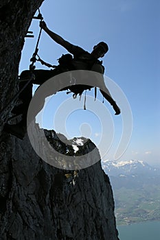 Silhouette of a climber photo