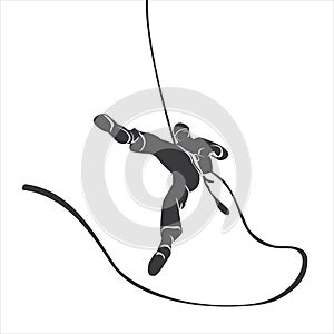 Silhouette of a climber abseil