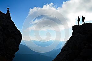 Silhouette climbers view summit