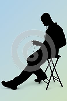 Silhouette With Clipping Path of Man Listening to Headphones Over Blue-Green Background