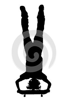 Silhouette With Clipping Path of Teen Boy On Skateboard Handstand