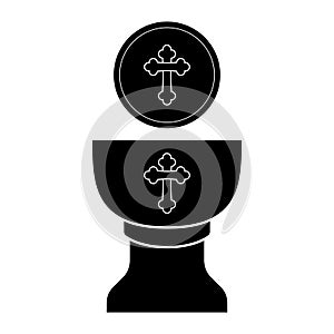 Silhouette of a communion cup and host