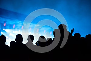 Silhouette of concert crowd and stage lights