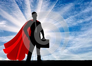 Silhouette of a confident and strong superman businessman photo