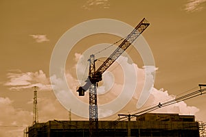 Silhouette construction industry building on high ground sepia s