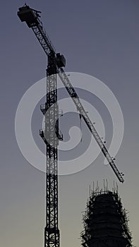 Silhouette Construction Phra Chedi Tham Singhaburajariyanusorn, Amphawan Temple, Beautiful Silhouette crane under construction