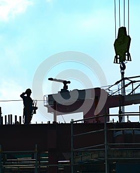 Silhouette construction worker site man