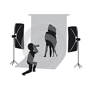 Silhouette of couple making photoshoot in photo studio