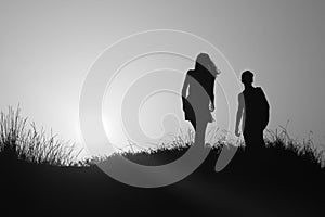 Silhouette man and woman backlighting photo