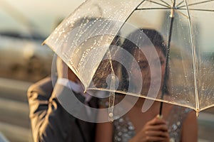 Silhouette couple prewedding under umbrella