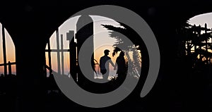 Silhouette of couple on San Simeon Beach