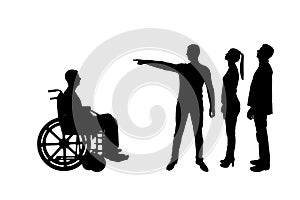 Silhouette . Crowd of people makes it clear to an invalid in a wheelchair that he must walk away