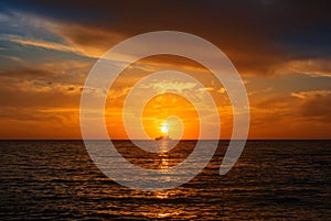 A silhouette of a cruise ship boat at the horizon seascape float