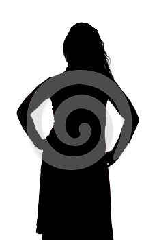 Silhouette of curvy woman with hands on hips